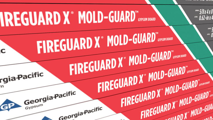 ToughRock® Fireguard X® Mold-Guard™ Gypsum Board close up on side tape which is vertical lines in the colors green, red, white and gray